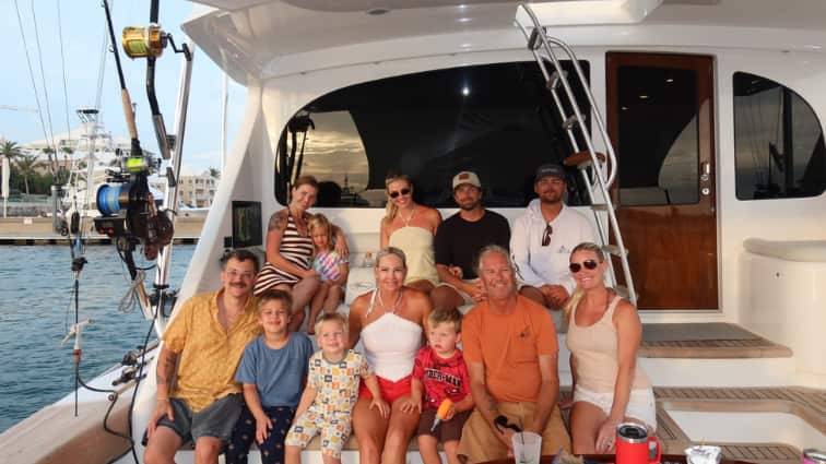 bobbi and tram with their family on the back of miss magnolia
