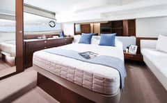 f50-interior-owners-stateroom-walnut-satin