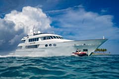 https://charteryachtrelentless.com Elegance meets power with this solid and artfully constructed 145′ Trinity Yacht. After chartering her for five years, the current owners purchased Relentless in late 2018 and have enjoyed upgrading and refitting her. Come relax in the impeccable craftsmanship of her exquisitely designed, soft beige and gold-accented interiors. Opulent dining, spacious interiors, and panoramic views will take your breath away… pampering awaits. Her main salon includes a sit-down bar aft, salon area with entertainment and a separate private formal dining room where the chef’s culinary creations are waiting to delight. Relentless features five lavish staterooms including a king master suite located on deck with his and hers bathroom to include a large shower and Jacuzzi tub. Four additional guest staterooms are located below, which include two king staterooms, one queen and one twin, all with en-suite bathrooms, full entertainment systems and large closets for storage. The sky lounge offers a comfortable gathering area to watch movies, enjoy afternoon treats from the chef and is a popular guest area. Step outside to experience our three spacious decks and submerge yourself in 360 degrees of breathtaking vistas. All decks feature ample seating, tables and chairs for socializing and dining. The spacious sky lounge deck features a large round table where many theme parties are held. The crew of Relentless have a huge assortment of fun filled themes from fun to formal and anything in between. If you’re feeling invigorated, Relentless offers a treadmill and full assortment of gym equipment for outdoor exercise on the newly refit flybridge. The flybridge was reconfigured with a new Jacuzzi, wraparound sun beds, lounging furniture and new sit-down bar as well as a movie night option under the stars. Relentless offers a full list of water toys for your fun and adventure and has a proven charter crew of 9.