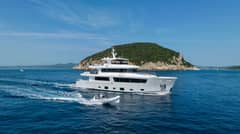 The SABAI is an exquisite 33.8-meter tri-deck charter yacht, built by Cantiere Delle Marche in 2019 and recognized with the prestigious 2019 Boat International Design and Innovation Award. Combining boho-luxe interiors with innovative design, the yacht seamlessly merges comfort and sophistication. Its fluid architectural lines and natural tones create a harmonious environment that blends effortlessly with the surrounding ocean. The yacht accommodates 10 guests in five luxurious staterooms, including a master suite on the main forward deck and four additional spacious staterooms amidships. The floating glass staircase, a centerpiece of the design, connects the levels with a sense of elegance and airiness. Guests can indulge in the sundeck's illuminated glass-walled jacuzzi, offering panoramic views and a serene retreat. Surrounding it are plush sunpads and ample leisure space for socializing or relaxing. Adjacent to this area is a covered alfresco dining and bar space, providing shelter from the wind while maintaining a strong connection to the outdoors. The main salon, designed for lounging, flows effortlessly into the open sundeck, while the upper salon features a formal dining area centered around a striking table. The dedicated crew of six ensures every need is met, while the onboard chef prepares gourmet meals tailored to guests' dietary preferences. Whether seeking laid-back elegance or thrilling water sports, SABAI delivers an unforgettable charter experience.