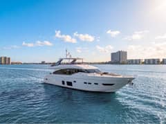 2017 Princess Yachts 88 Flybridge - White flybridge motor yacht underway on open water, starboard profile view