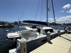2008 Fountaine Pajot 48 Salina - Sailing catamaran moored alongside a dock, viewed from the stern quarter