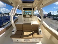 2017 42' 1" Scout 420 LXF - Cockpit bench seating under hardtop with center console helm area forward