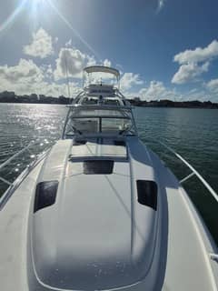 2018 47' 6" Intrepid 475 Sport Yacht - Bow deck looking aft toward windshield, hardtop and upper helm station