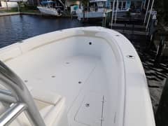 2017 28' Bluewater Sportfishing 2550 CC - Bow deck area with flush hatches, rod holders and forward seating