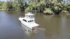 2004 Cabo 48 Flybridge "MERRY YACHT" photo 1