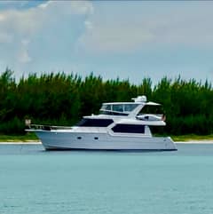 2005 ALTIMA 55 Pilothouse "Constant Craving" photo 1