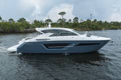 2020 46 Cruisers Cantius - Starboard profile view of an express cruiser on the water