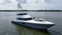 2016 Viking 92 Enclosed Bridge "Touché" photo 1