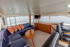 2006 Viking 74 Enclosed Bridge "KICKBACK" photo 4
