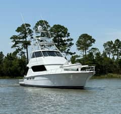 2002 Hatteras 65 Enclosed Bridge "MoonTan" photo 1