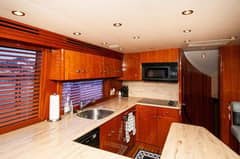 2002 Hatteras 65 Enclosed Bridge "MoonTan" photo 5