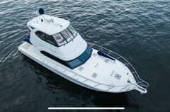 2009 Riviera 47 Enclosed Flybridge Series II "47 Riviera Enclosed Flybridge Series II / 2009" photo 2