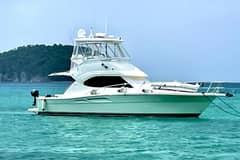 2005 Riviera 37 Flybridge "Work to Play" photo 1