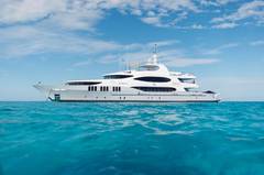 The 164&rsquo; (50m) 2008 Trinity charter yacht TCB ('Taking Care of Business') is ideally suited for even the most discerning of luxury charter guests. This versatile yacht aims to please all, whether traveling with friends or family. Having undergone an extensive, multi-million-dollar refit in 2022, TCB offers a wide range of amenities, accommodations and absolute excellence. She has been completely transformed and modernized into an opulent charter yacht without limitations. 

As guests step aboard, they will be greeted by TCB&rsquo;s cozy aft deck, an ideal spot for settling in, sitting back and watching the embarkation port fade into the distance. In the mornings, the aft deck serves as the perfect locale for alfresco lounging with a morning coffee. Guests will find the stunning open-plan main salon and formal dining area through the sliding doors. Neutral-toned furnishings complement the wood accents that adorn the walls and ceiling. The superyacht&rsquo;s main salon showcases an effortless blend of natural and ambient lighting, allowing the space to feel light and airy. 

TCB accommodates up to 11 guests to spend restful nights in her five beautifully-appointed staterooms. The full-beam, split-level master suite is ideally suited for privacy. 180-degree views can be seen from the upper level, giving this space a flow of natural light. A unique feature of this stateroom is the intimate lounge on the lower level, perfect for taking a break from the action and unwinding in seclusion. A large his-and-hers en-suite is accessed through the lower level lounge and features a large Jacuzzi tub, vanity and shower. TCB&rsquo;s additional accommodations include four en-suite staterooms on the lower deck, comprised of three king-size staterooms and one twin stateroom with a Pullman, perfect for accommodating small children. Each stateroom onboard showcases elegant styling as seen throughout the yacht&rsquo;s interior. 

Accessed by a grand central staircase, charter guests will find the stunning skylounge, complete with self-playing baby grand piano, fireplace and full bar surrounded by unbeatable views. The 75-inch TV offers top-of-the-line entertainment with Apple TV, a Kaleidescape movie system with more than 1,800 movies and the latest video gaming systems. The large L-shaped sofa invites guests to sink in and unwind after a long day on the water. Aft of the skylounge is the beautiful alfresco dining table for 11, complete with a breathtaking backdrop of the surrounding scenery. 

Guests can make their way up to TCB&rsquo;S vast sundeck for fun in the sun. On this level, an alfresco gym provides guests the ability to keep their workout routine while on board with an arrangement of equipment at their disposal. A large six-person Jacuzzi invites guests to soak in the shade. The charter yacht&rsquo;s deck space is large enough for guests to move around comfortably. Large built-in double-facing sunpads and sun loungers ensure guests will be in complete comfort while sunbathing, and optional shading is available when desired. TCB&rsquo;s full complement of water toys will do the trick for those seeking a little exhilaration. TCB&rsquo;s plethora of water toys are readily available for each guest&rsquo;s enjoyment. Easy access to water toys is available from TCB&rsquo;s extended swim platform and docking system making the switch from ski&rsquo;s to wave runners a breeze. No matter the group, guests of all ages will find that TCB and her experienced, charter savvy crew exceed expectations.