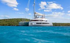 PLUS 10 is a Fountaine Pajot Samana 59 sailing catamaran designed for next-level space, style, and Virgin Islands adventure. A true highlight is the hard-covered flybridge&mdash;the largest in its class&mdash;with plush daybeds and a full lounge for panoramic views from sunrise to stargazing. The bow&rsquo;s sunken seating and trampoline add another favorite hangout, while the aft lounge&rsquo;s teak table seats 8 for effortless alfresco meals. Inside, a spa-like interior features a drop-down TV and sleek bar for relaxed evenings. Sleeps up to 8 in 5 cabins, each with a private ensuite and individual A/C controls&mdash;ideal for extra space and privacy. Water toys are included for endless fun on the water, plus a strong tender for exploring. Big spaces. Calm luxury. Pure wow&mdash;PLUS 10 earns the name.