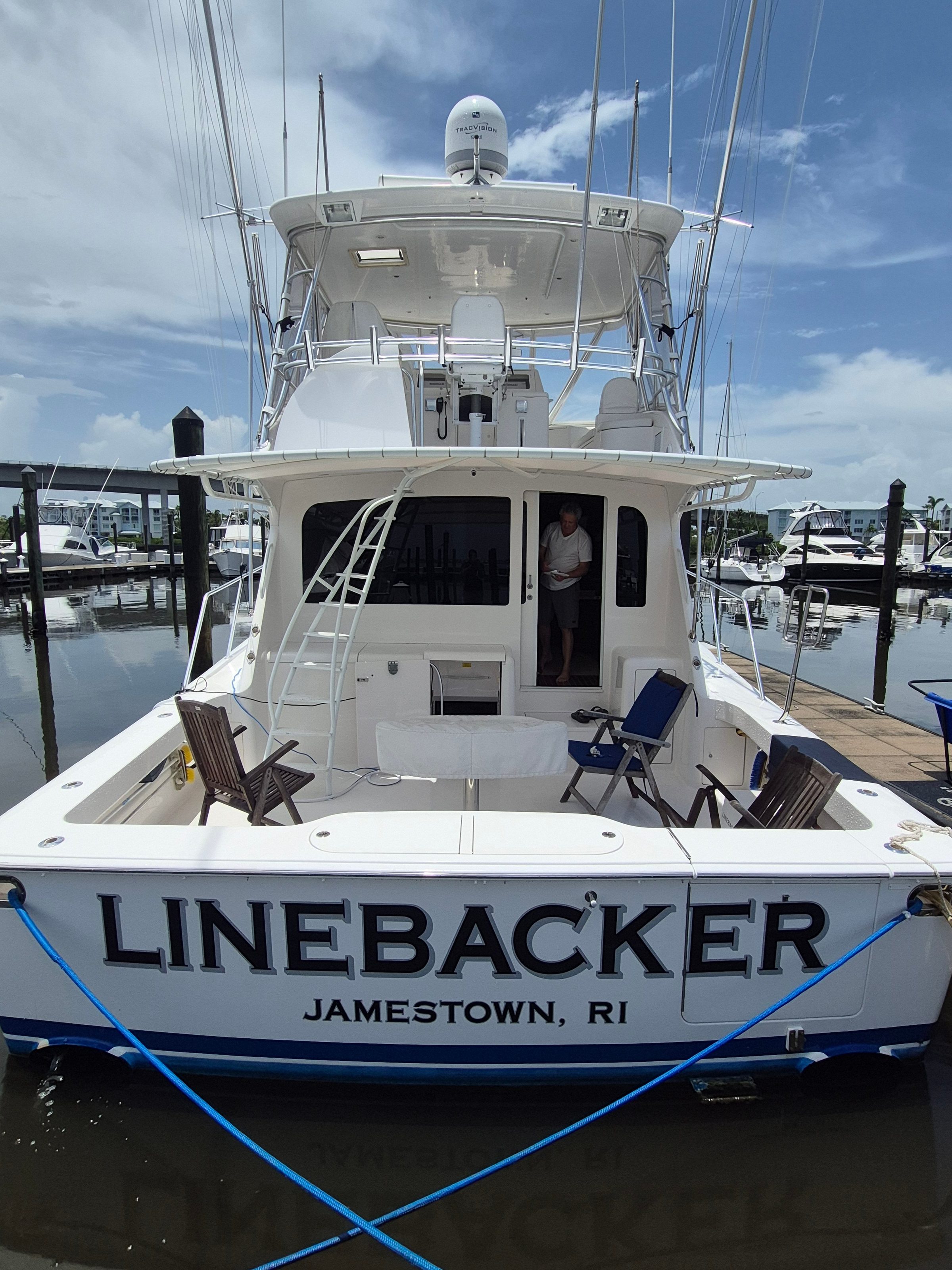2006 57' 5" Viking 56 Convertible - Stern view of a convertible sportfishing yacht showing cockpit, transom and flybridge