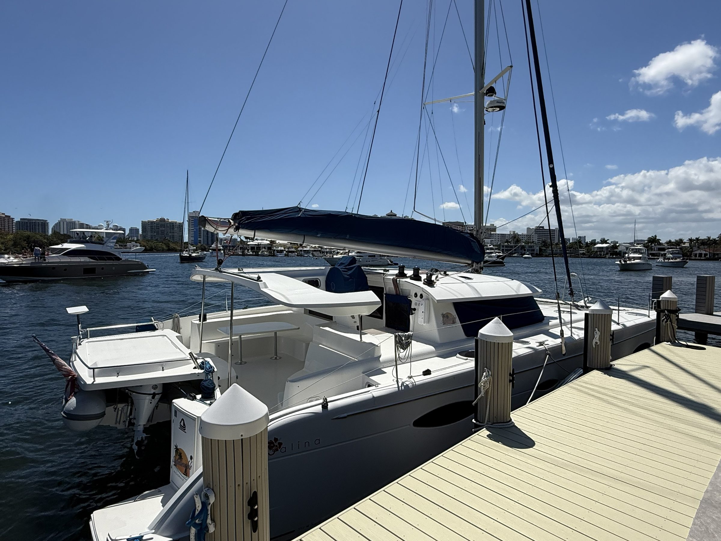 2008 Fountaine Pajot 48 Salina - Sailing catamaran moored alongside a dock, viewed from the stern quarter