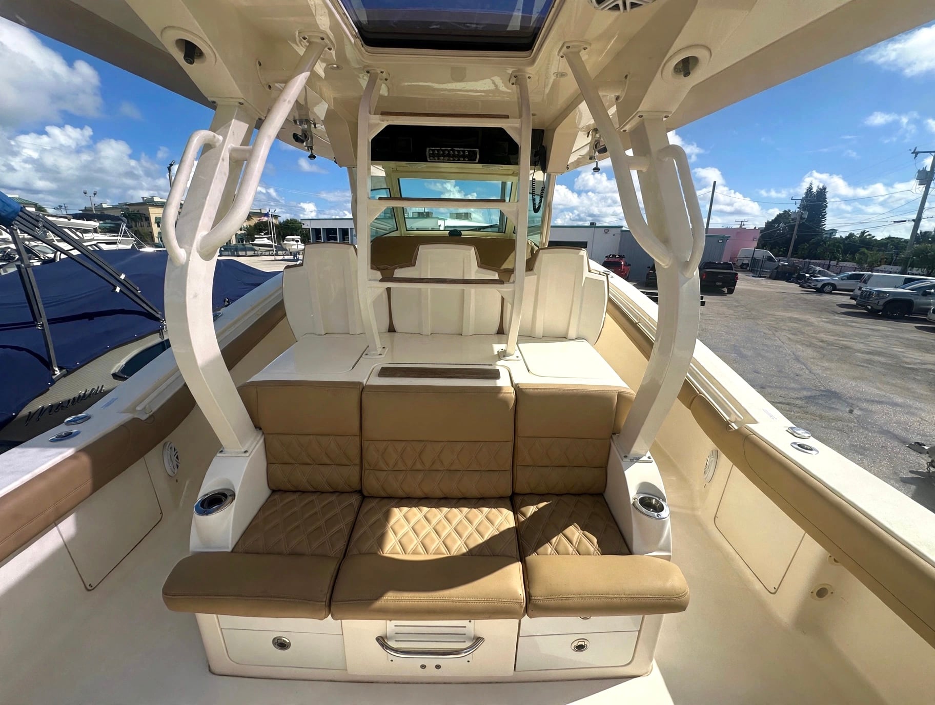 2017 42' 1" Scout 420 LXF - Cockpit bench seating under hardtop with center console helm area forward