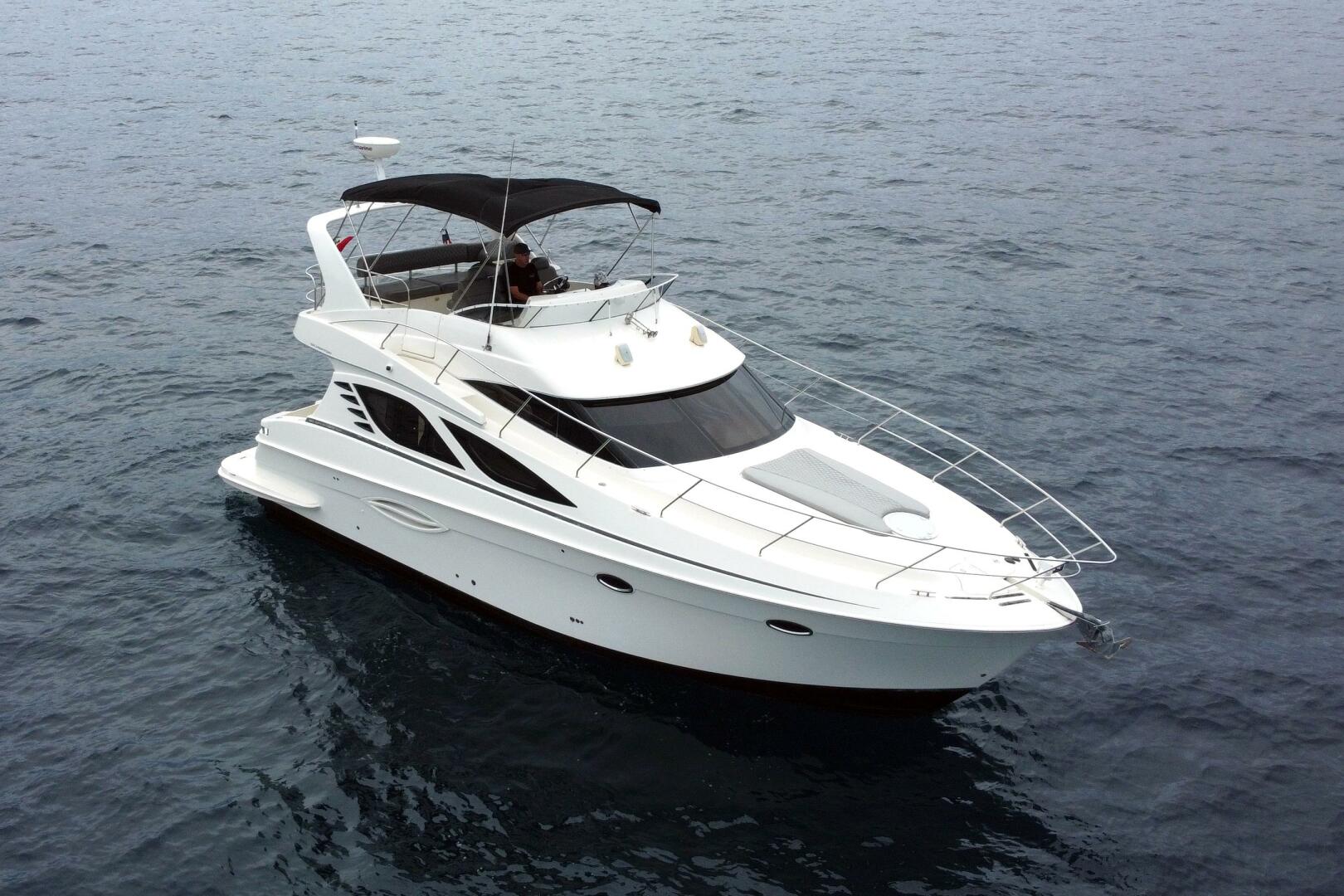 2010 Silverton 38 Sport Bridge "Pura Vida" - photo 1