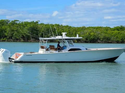 Valhalla V-46 center console drifting along Florida mangroves in calm water.