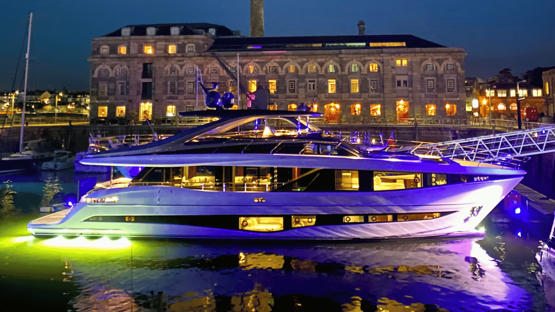 Y95 Princess with Lights on at a marina in England.