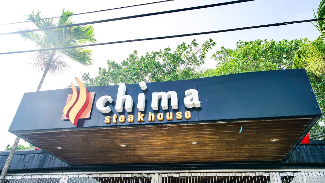 The sign on the front of the building for the Fort Lauderdale, Florida location of Chima Brazalian Steakhouse. 